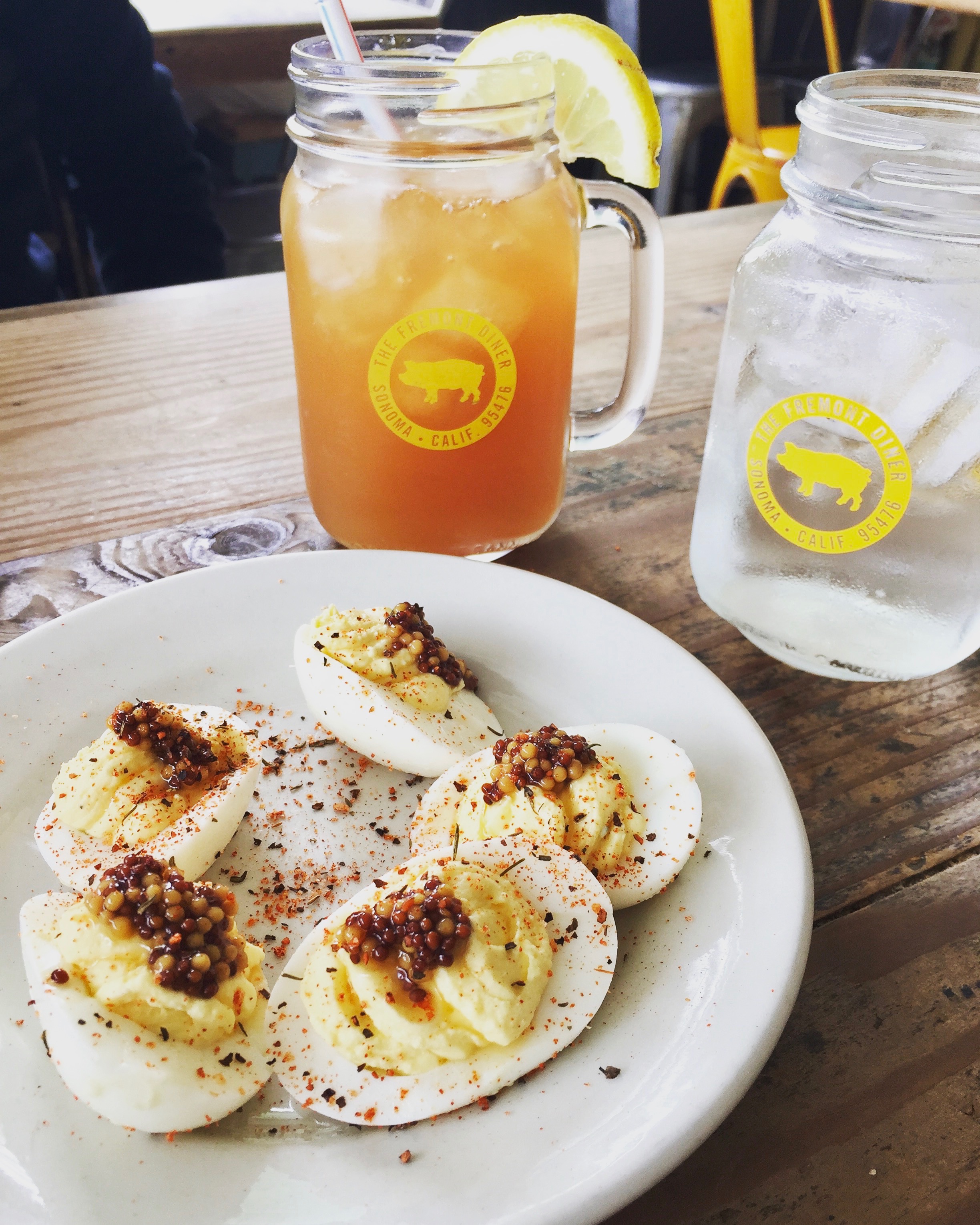 I typically start with the deviled eggs that have pickled mustard seeds. 