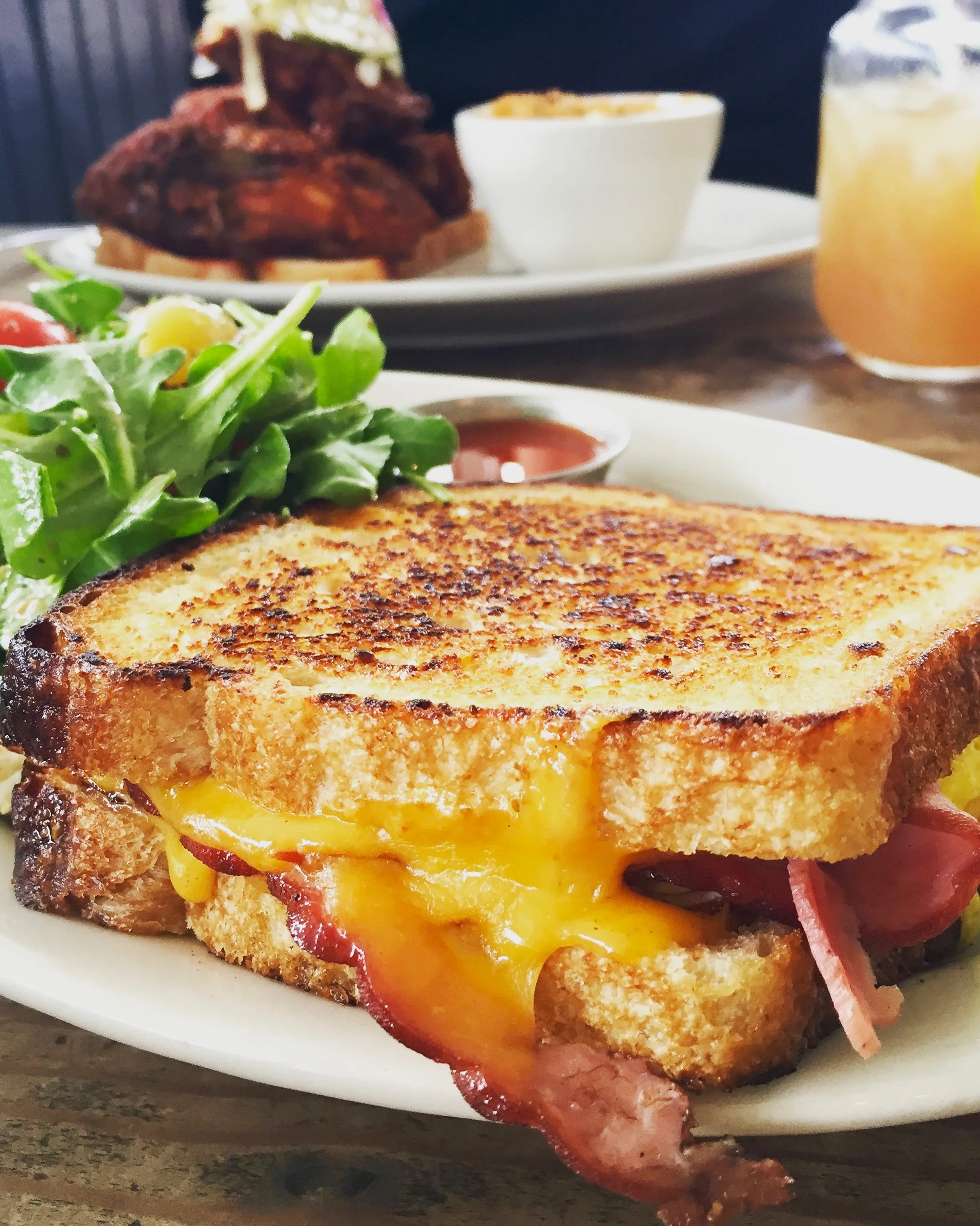Their take on a breakfast sandwich. Behind that, is their infamous fried chicken. 