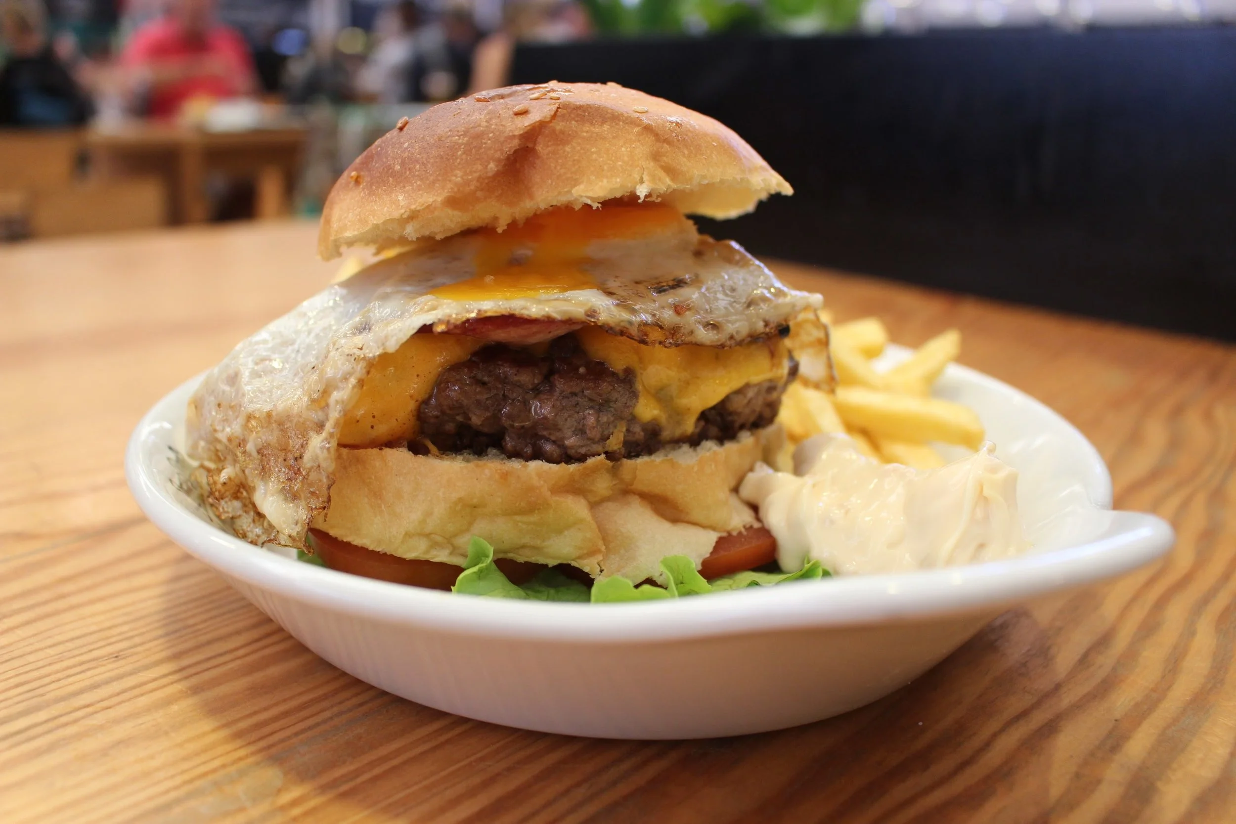 The Honorato burger. It had mayo, corn, lettuce, tomato, bacon, egg, cheddar. 