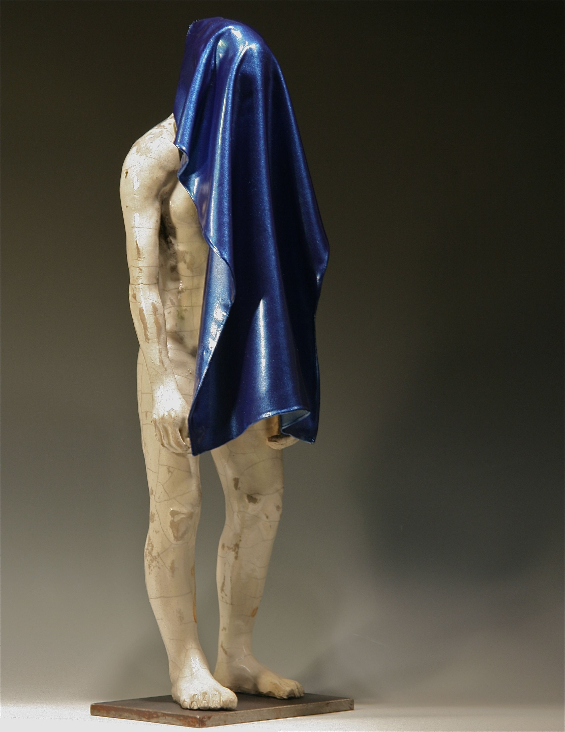   2011 (Man with Blue Towel)  23"H, raku-fired stoneware, linen, polymers, paint 