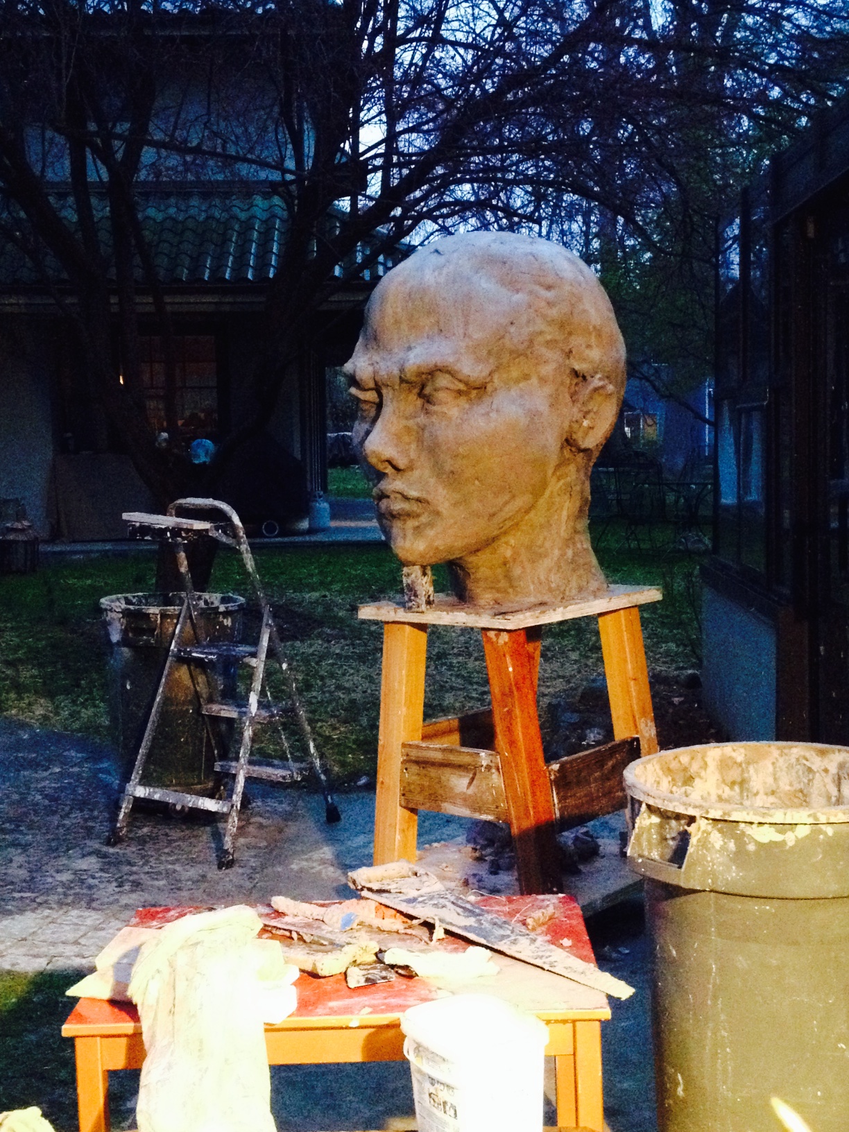 Head is 42"H. The new stand is holding up well, and only one prop under the chin to keep the face from falling off! The ears are just placeholders now as they will not be part of the mold and will need to be modeled and added directly on the finished piece.
