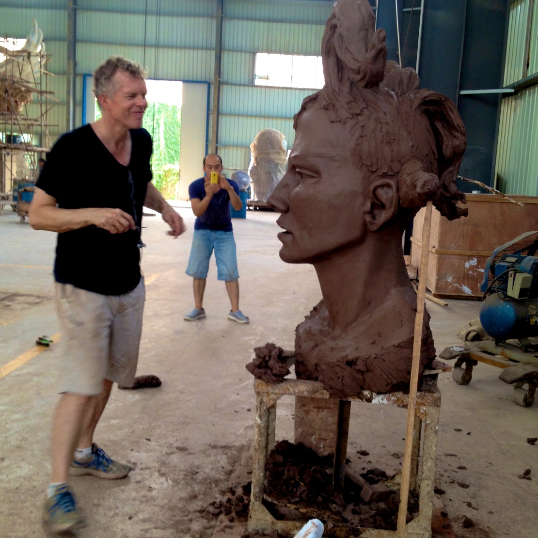 Bob modeling a clay head in Nanchang China, summer 2014