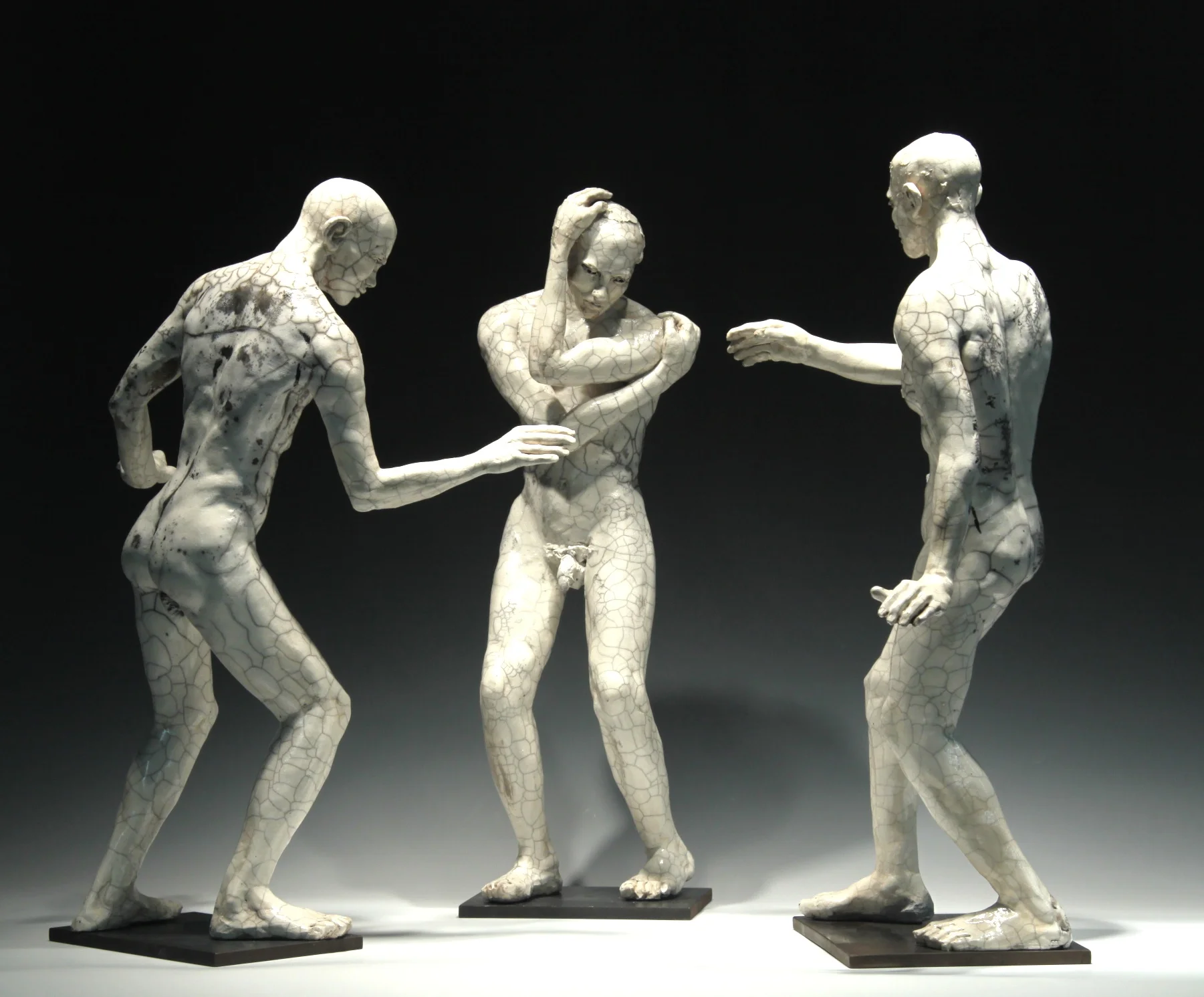  Some of these standing man figures are available, I would sculpt additional ones in the same style if you wanted this option.  These Mount on posts or short steel shelves, varying heights. 