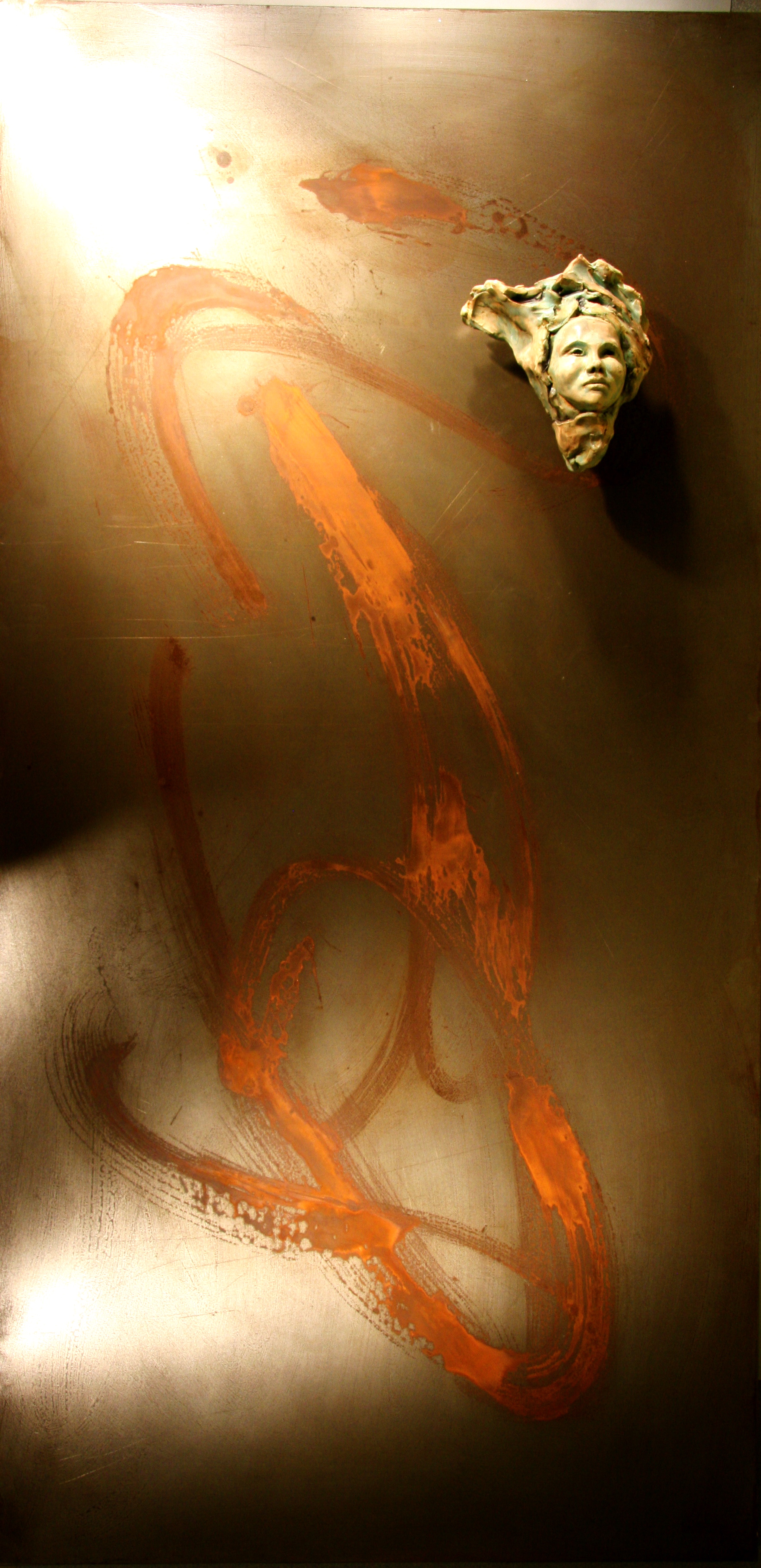 Another popular direction with the glazed ceramic on steel, with calligraphic etching of the steel using brushed chemical etching, then sealed.