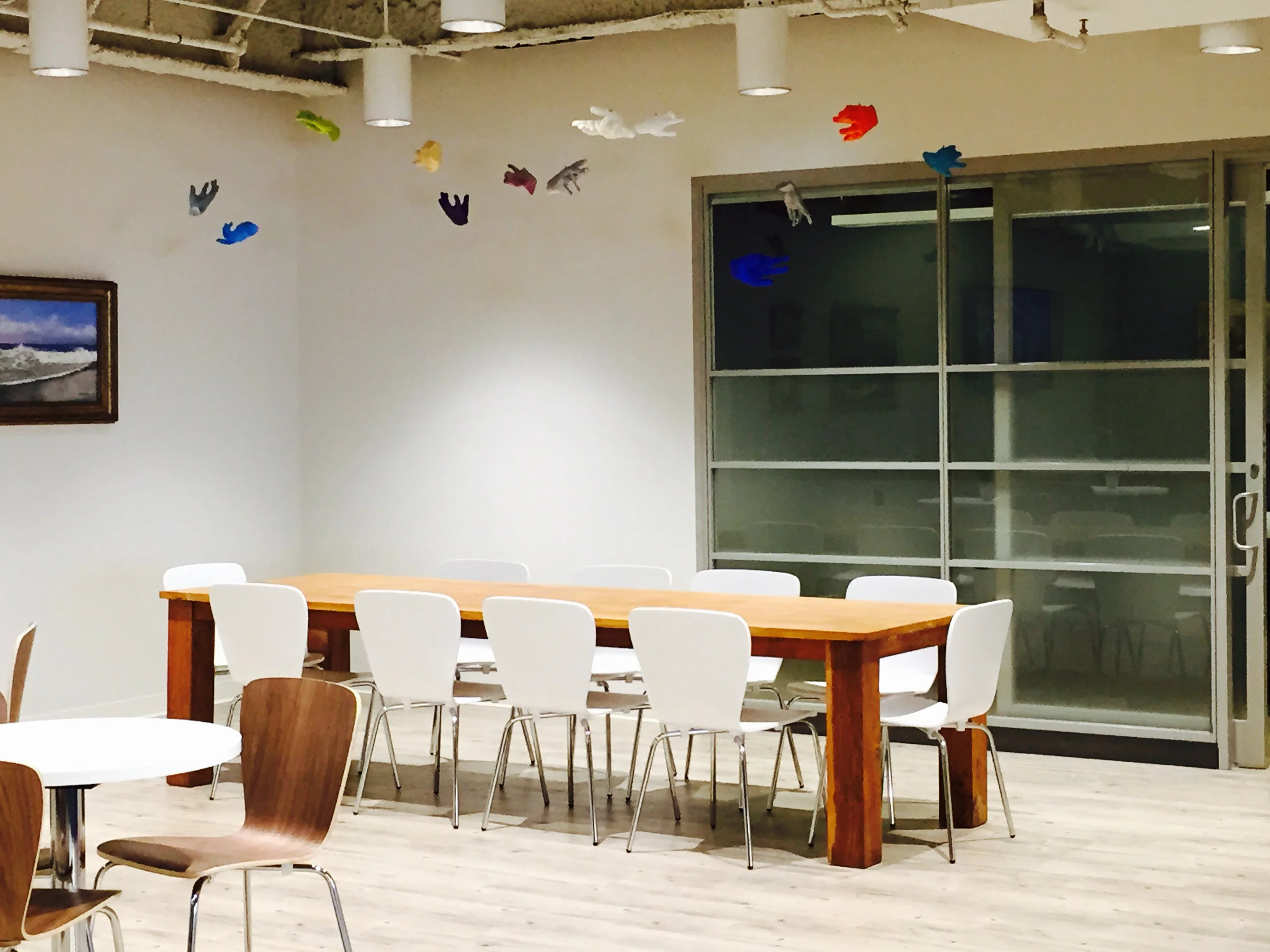  My hanging hands mobiles in multiple colors and materials, life cast, a custom installation could be made for your entry hall near the elevator. 