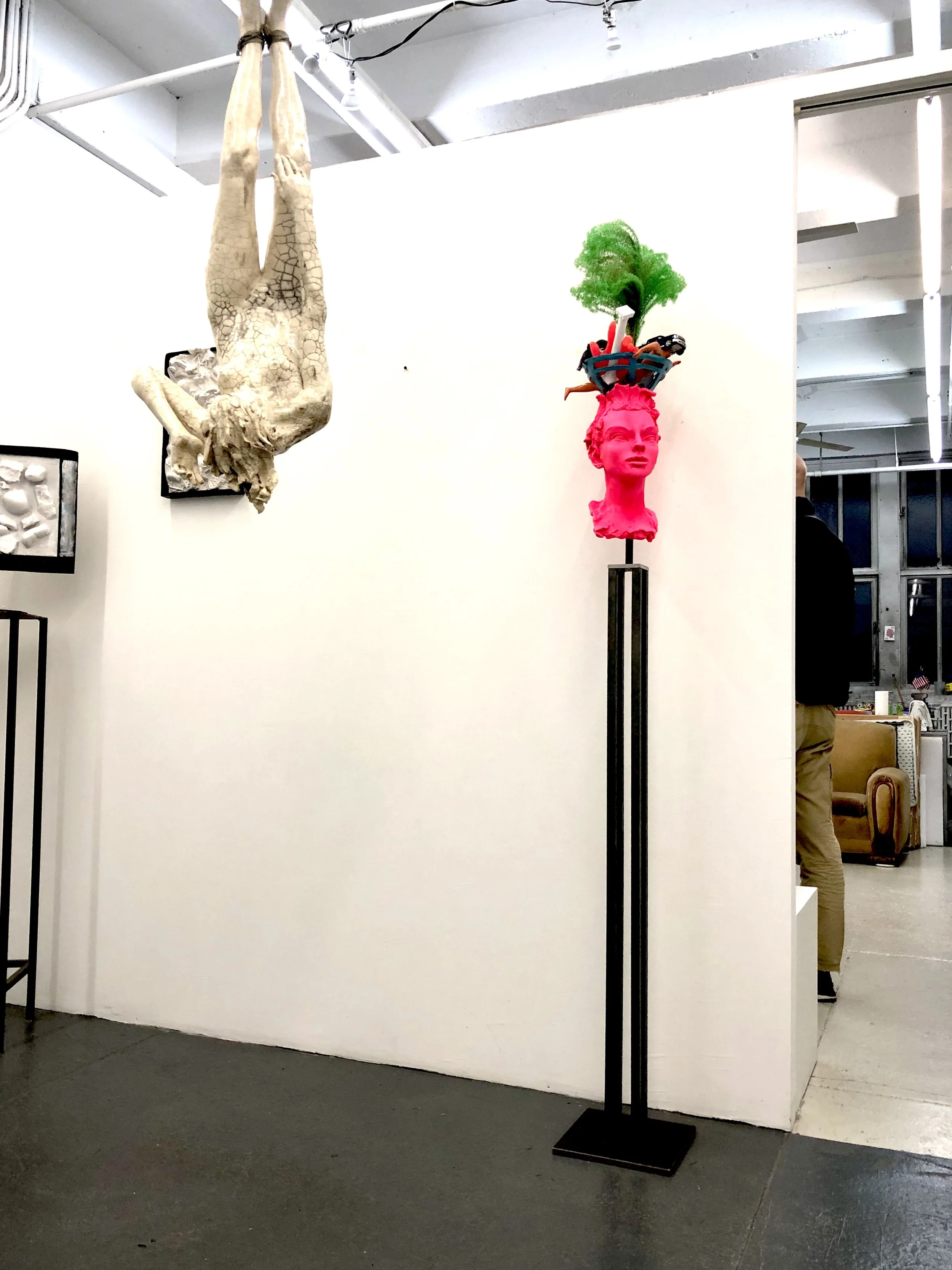  Available New head series on new-style steel pedestal. Would suggest multiple heads of varying heights, perhaps three. Could be different colors that enhance the form. This one has extra elements we could decide on or just have heads without extra a
