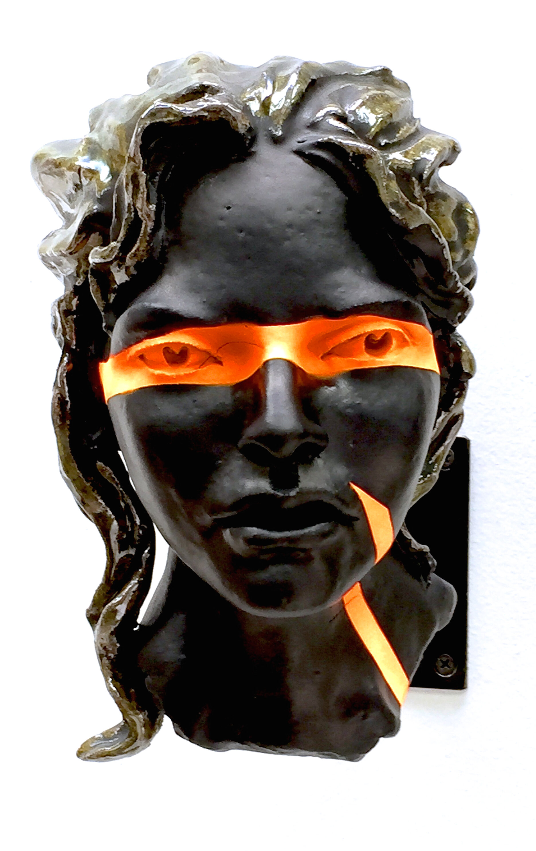  Womans Head with Fluorescent Orange Eyes, 10”H, high-fire stoneware, patina. 