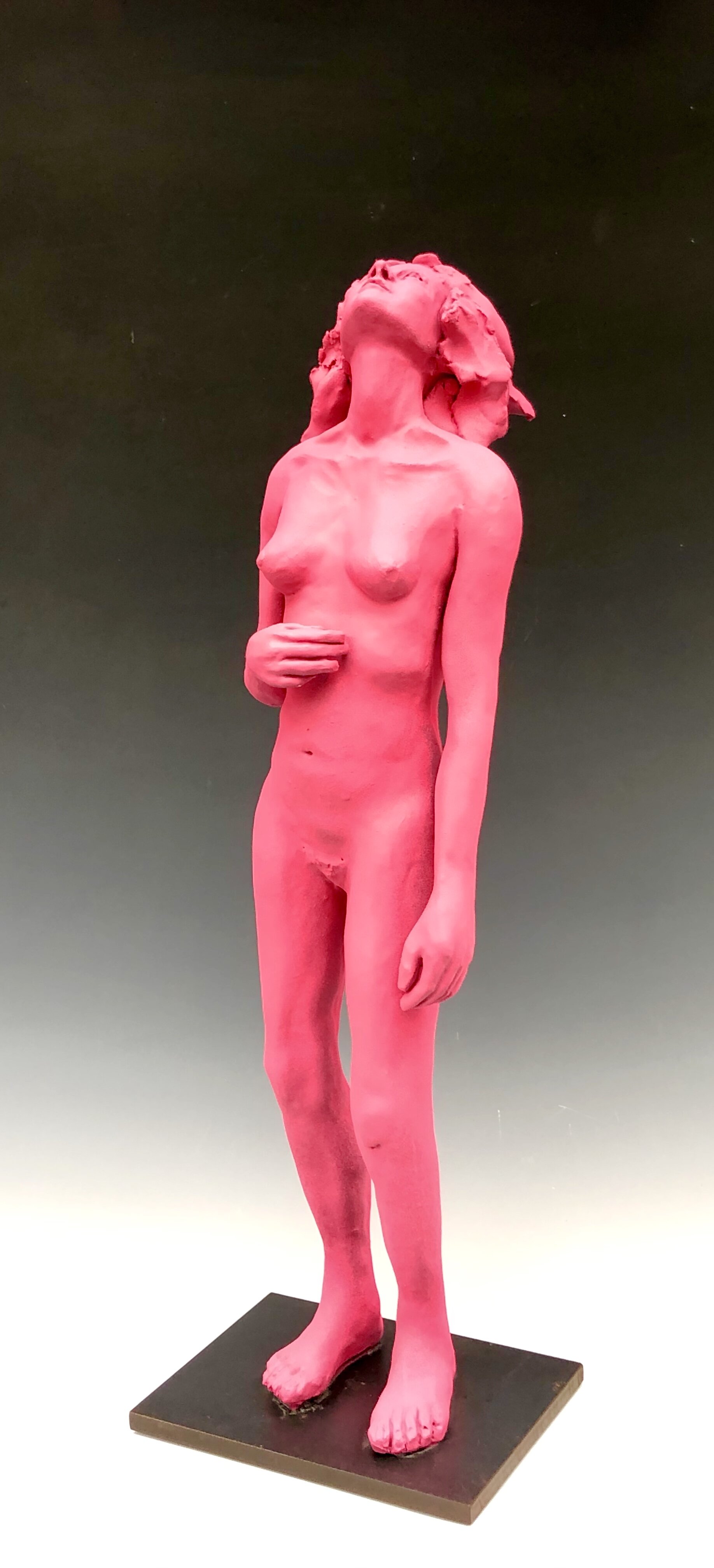 Standing Woman Looking Up (fluorescent magenta)- Bob Clyatt Sculpture.jpg
