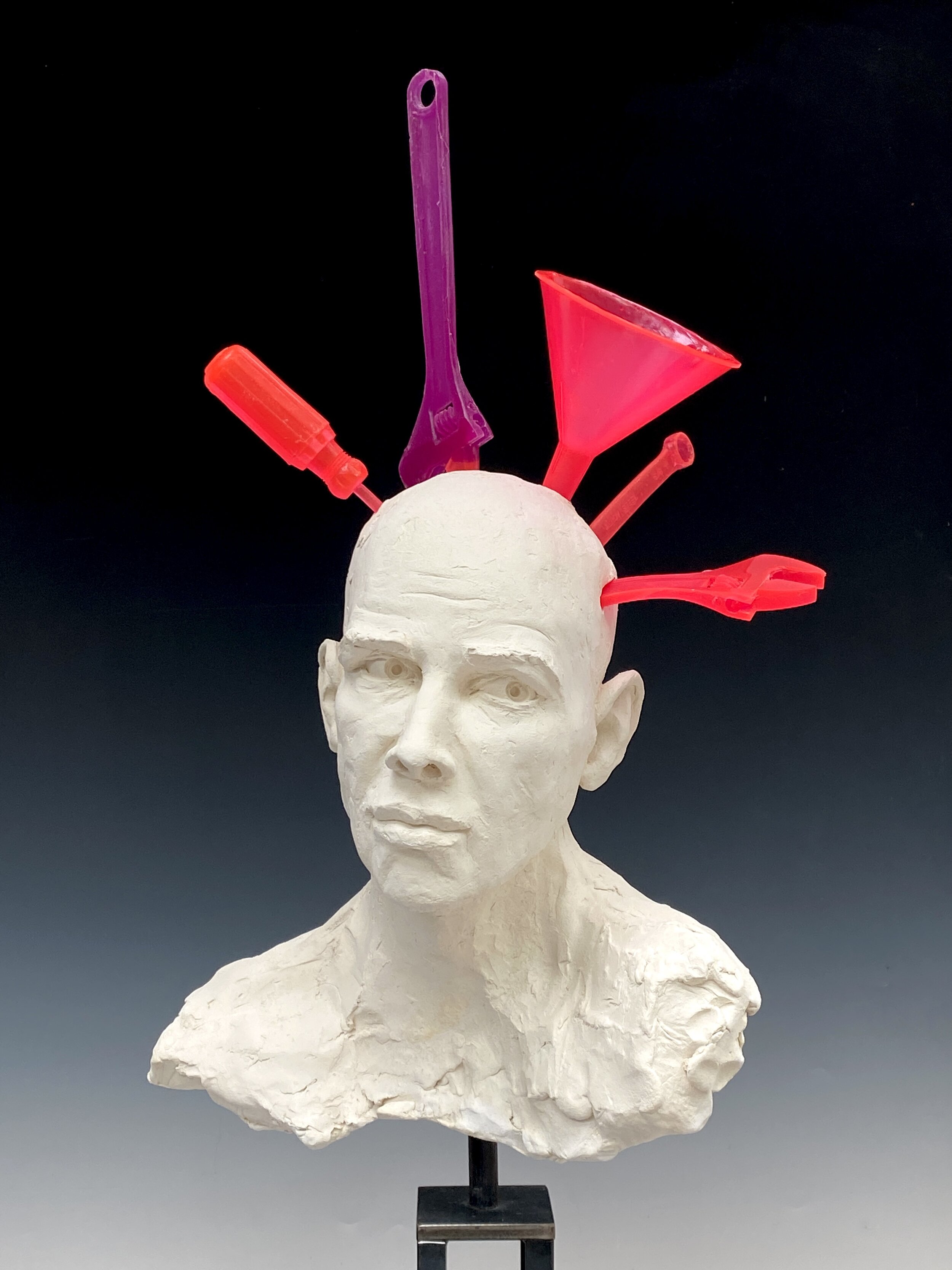    Man’s Head with Tools and Funnel  , 2021, Lifesize bisque-fired stoneware and resin on steel pedestal 