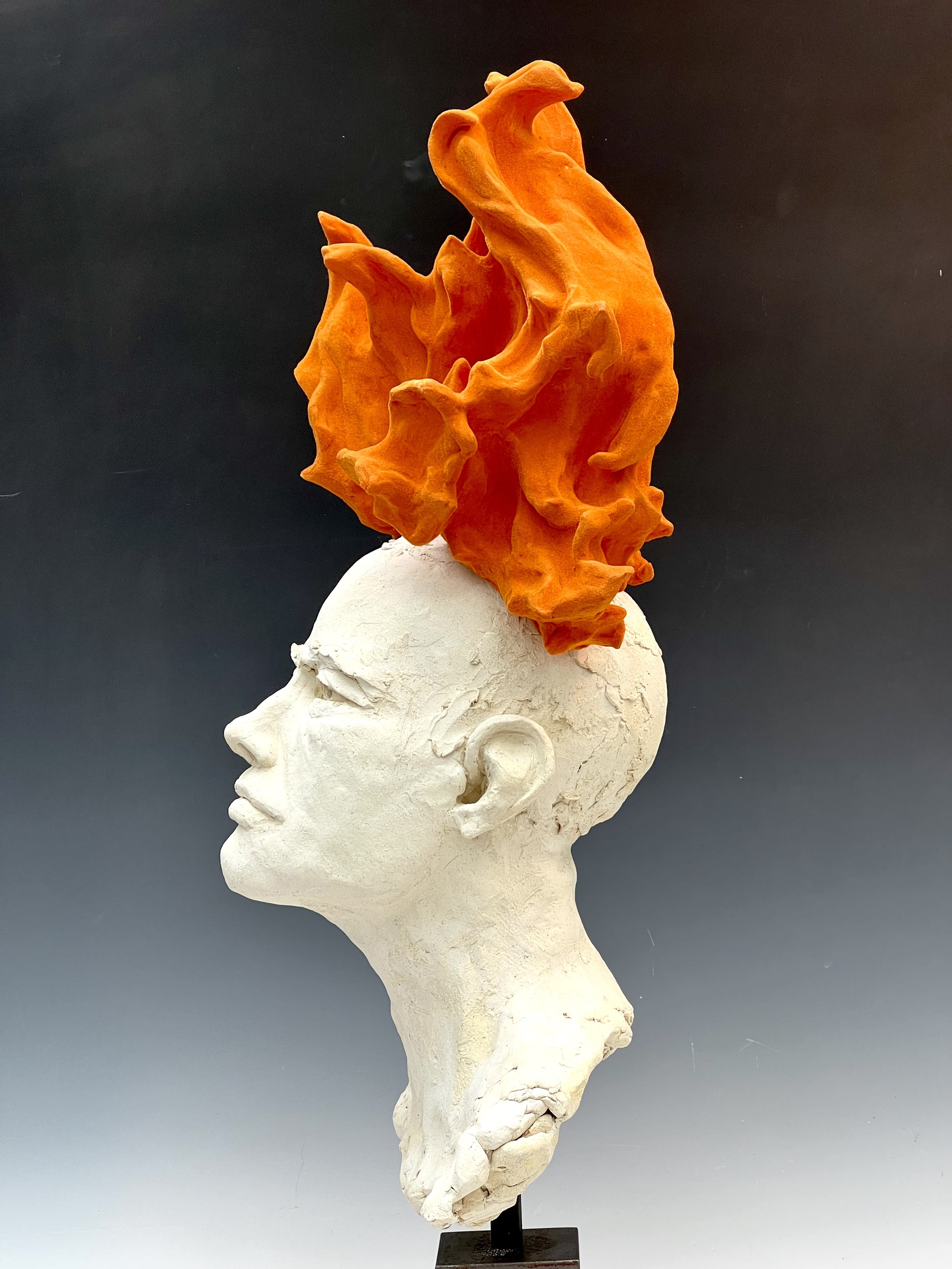  Man’s Head with Flame,  stoneware with patina 
