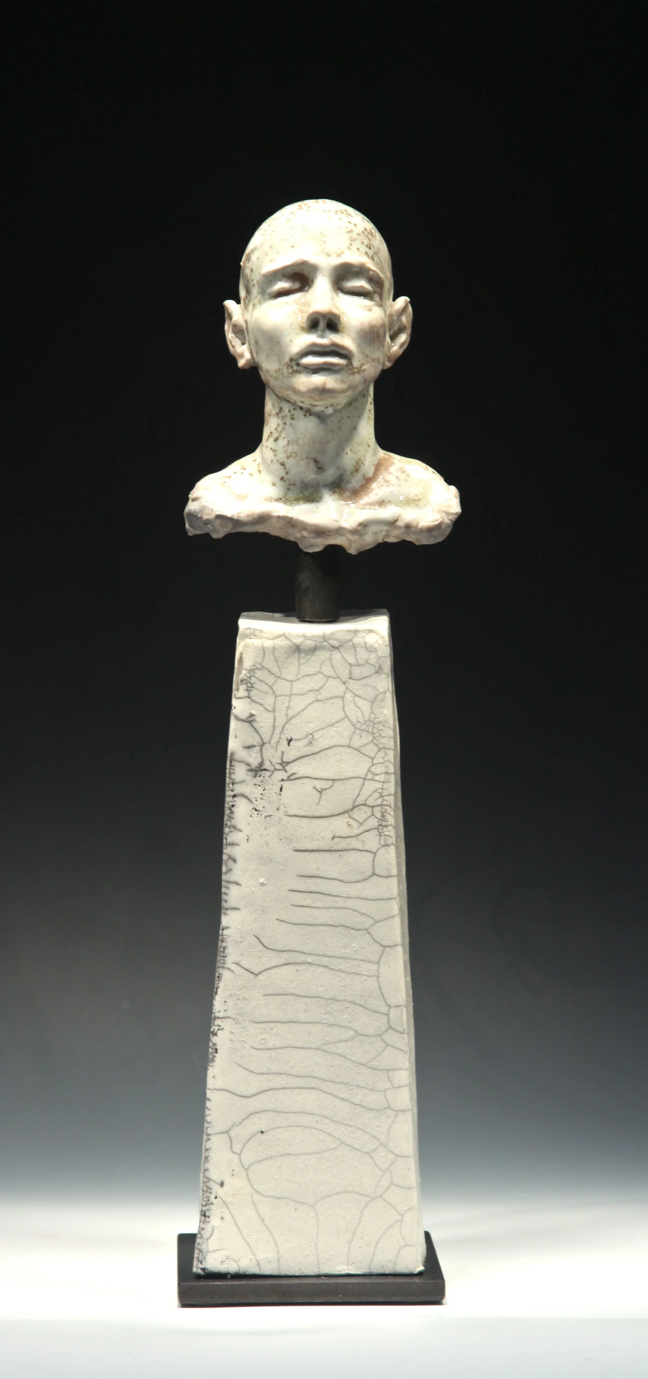 2 Man on Pillar Eyes Closed-L-Bob Clyatt Sculpture.jpg