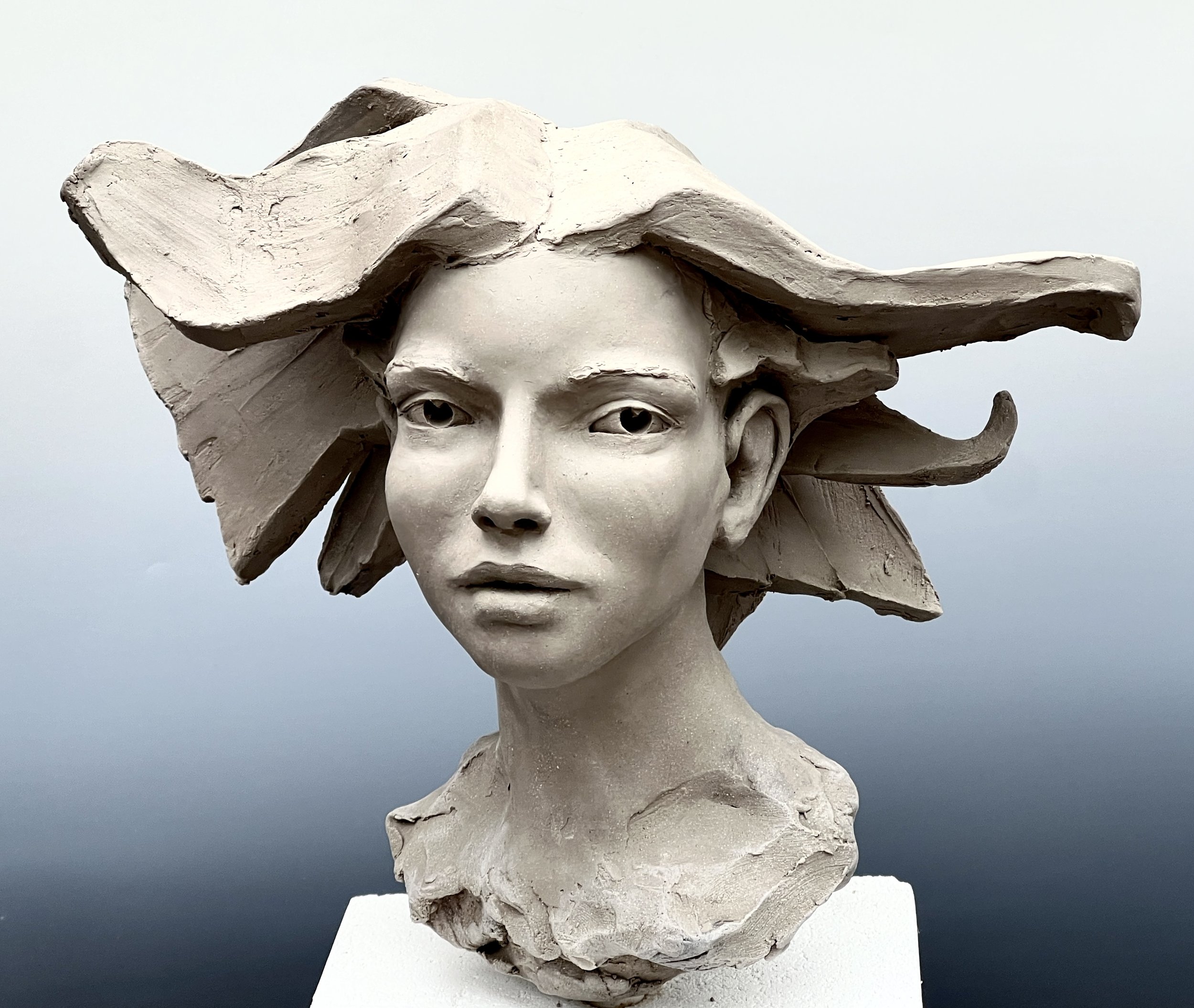  Woman’s Head, 2024, clay work in progress, 14”H 