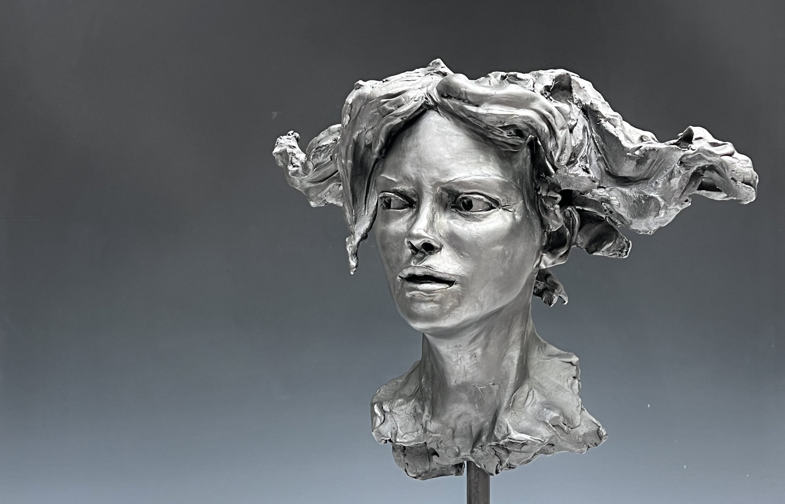 Woman's Head looking to side, 2018-2024- Bob Clyatt Sculpture.jpg