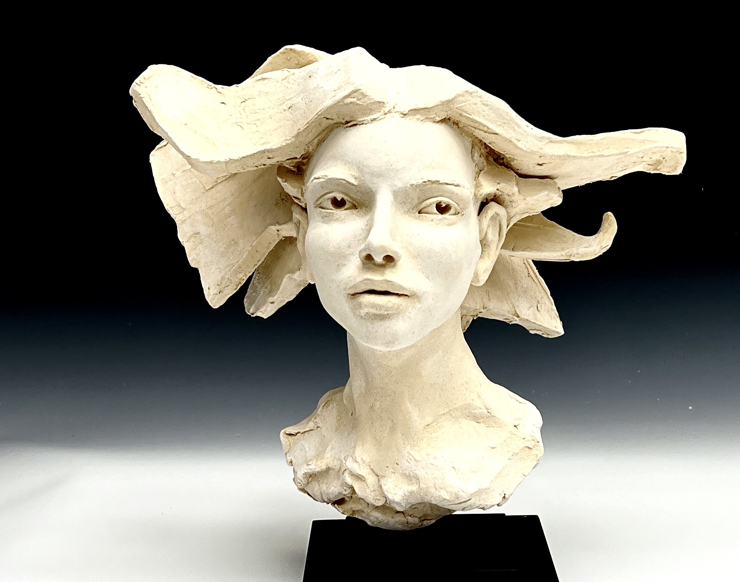 Woman's Head with Planes- Bob Clyatt Sculpture.jpg