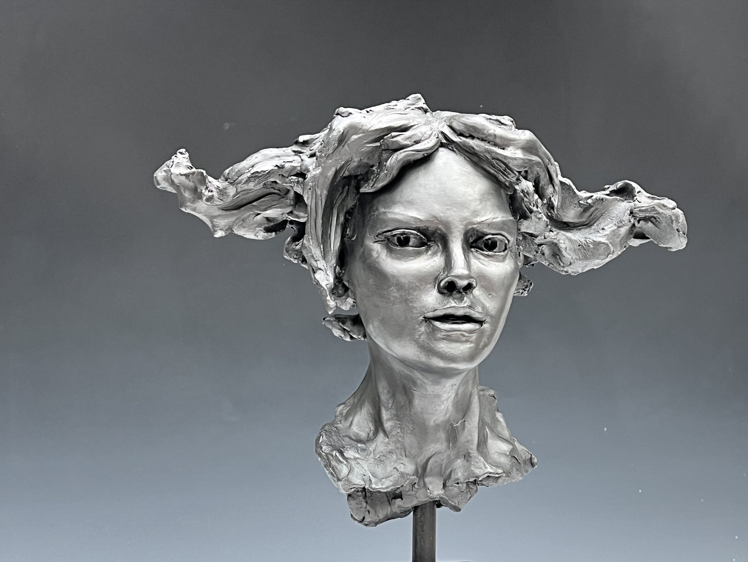 Womans head looking to side-F-2018-2024- Bob Clyatt Sculpture.jpg