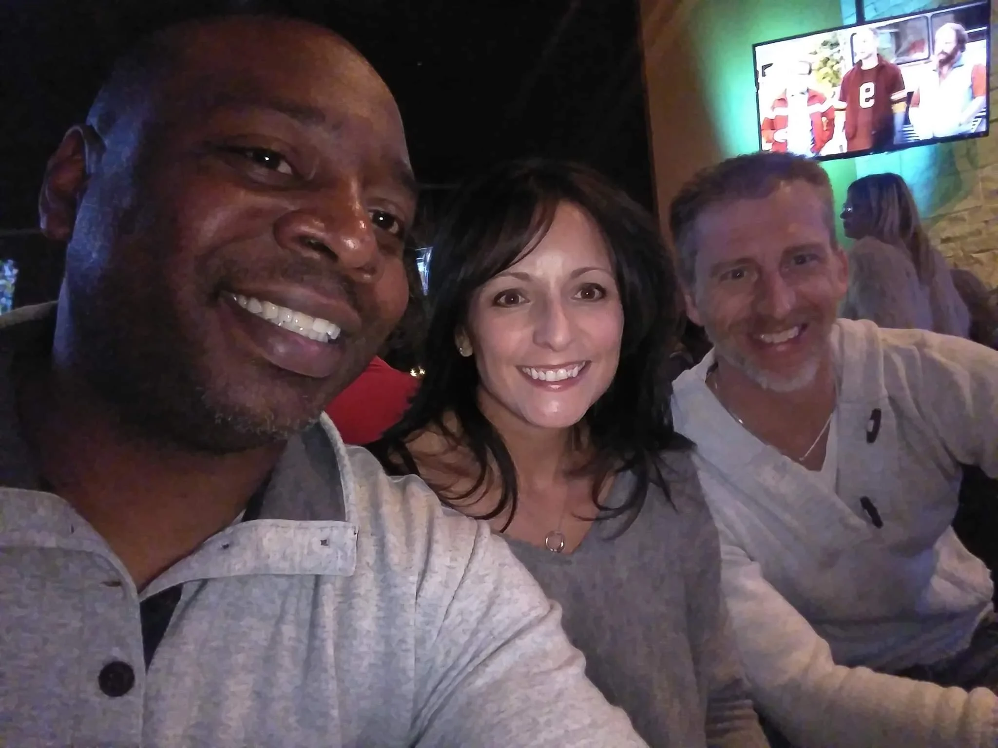 Here’s a photo of myself, Allyson and her awesome Husband John at my going away party in November 2018.