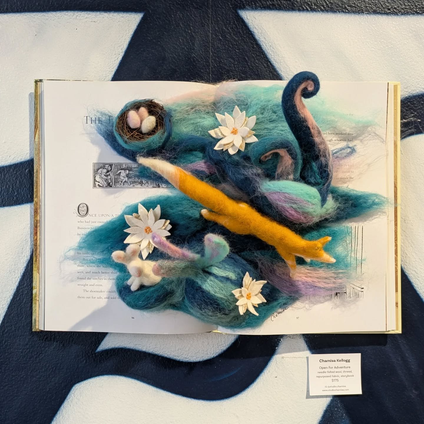 My piece &quot;Open for Adventure&quot; is currently up at @adxportland as part of the @artistsoffthepage show Fireplace Fables, along with work by 12 other artists. This piece is made of needle-felted wool and repurposed felt, along with a thrifted 