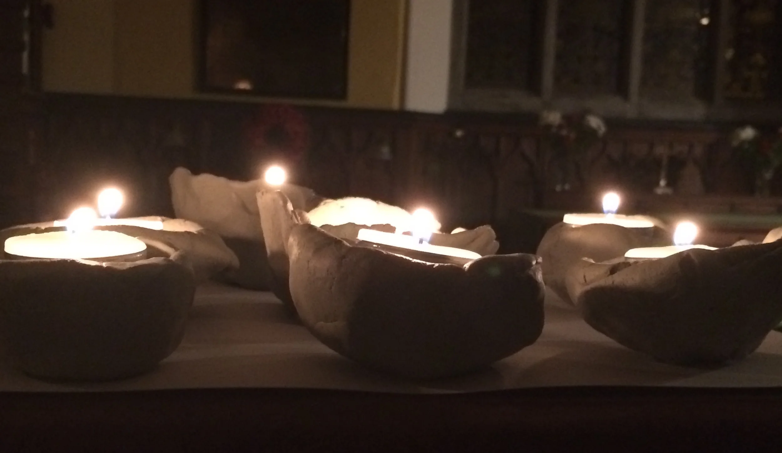"This treasure is in jars of clay..." Clay pots created during the late-night worship last night!