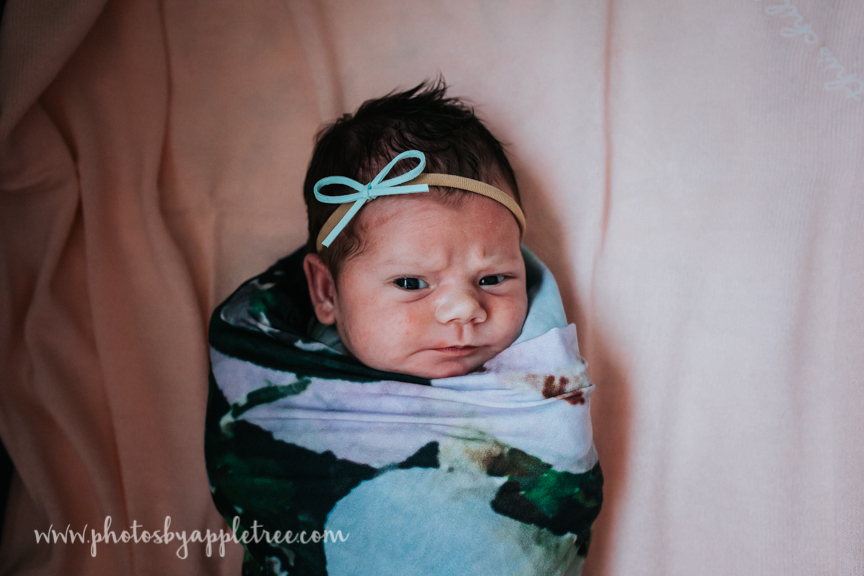 Another little girl, full of attitude! This wee one has two excited big brothers (and proud parents and grandparents) watching out for her! We had a lovely in-home newborn session on a lovely spring evening.