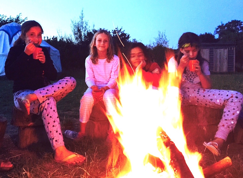  hot chocolate and songs round the campfire and a chance to reflect on a fun first day of camp! 