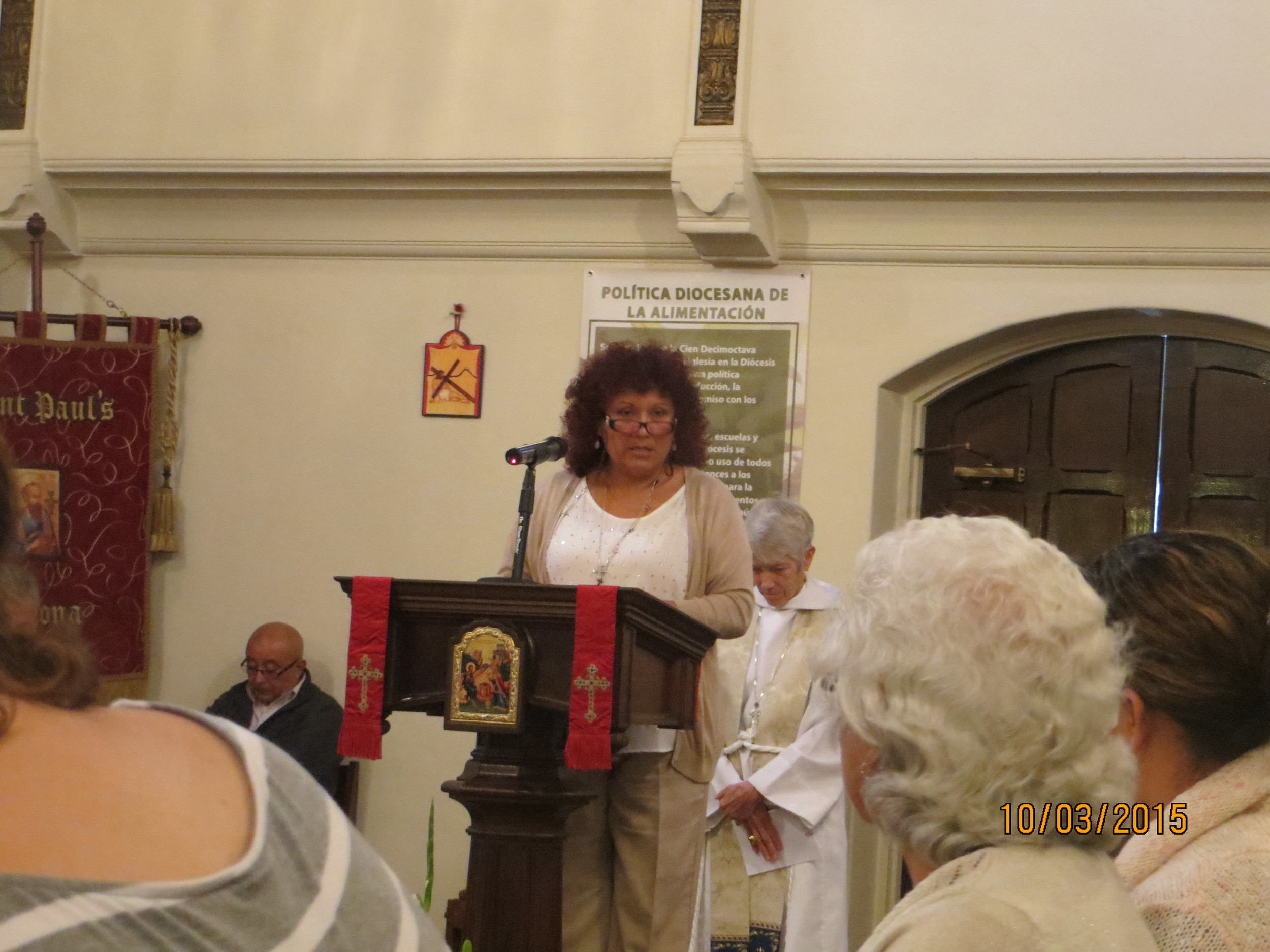 SANDRA TRANSLATING HOMILY.jpg