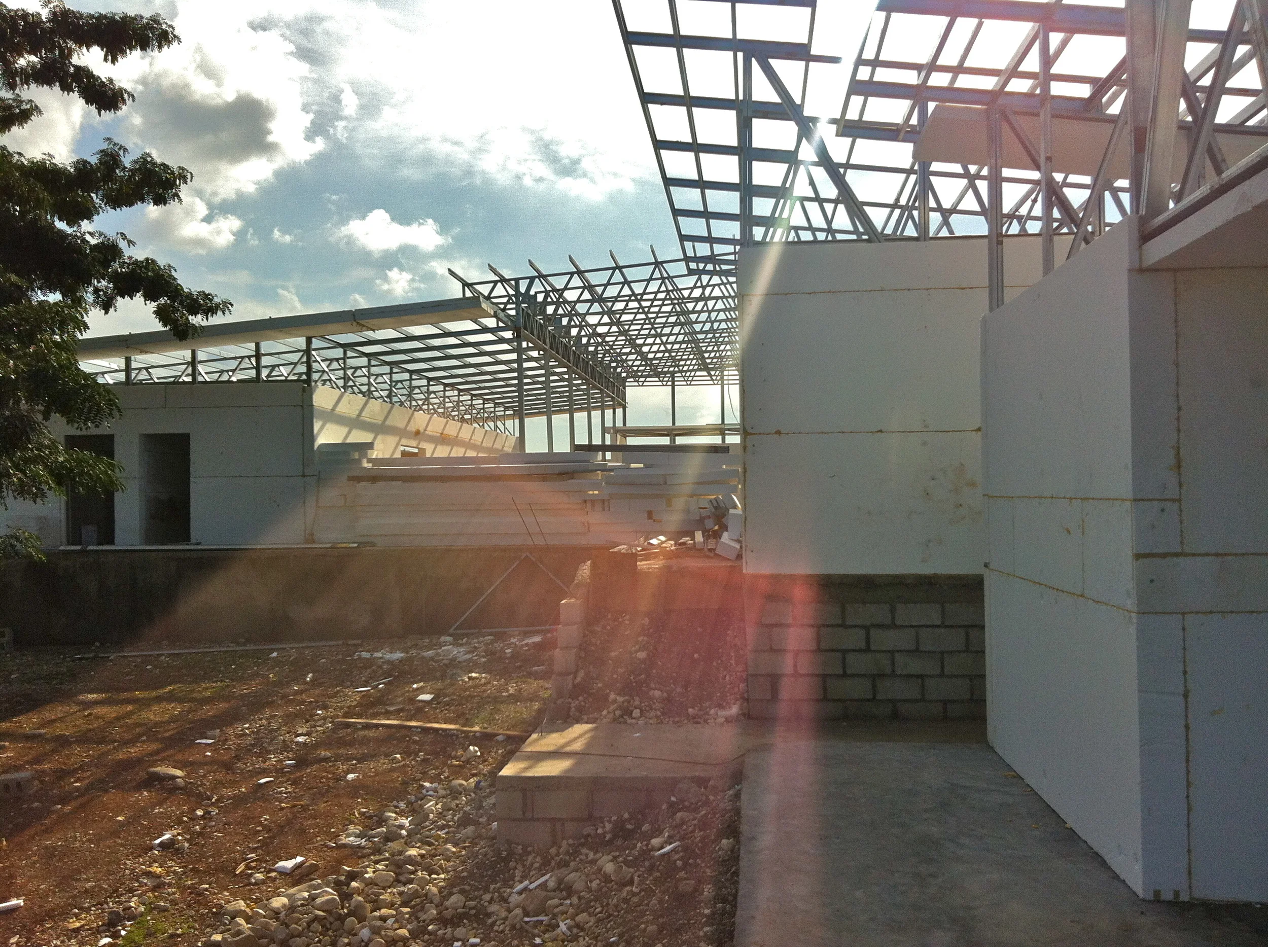  low impact construction with digital fabricated frame provides the integrity required for a safe, long lasting medical clinic. The building came in shipping containers and was erected on site by locals.&nbsp; 