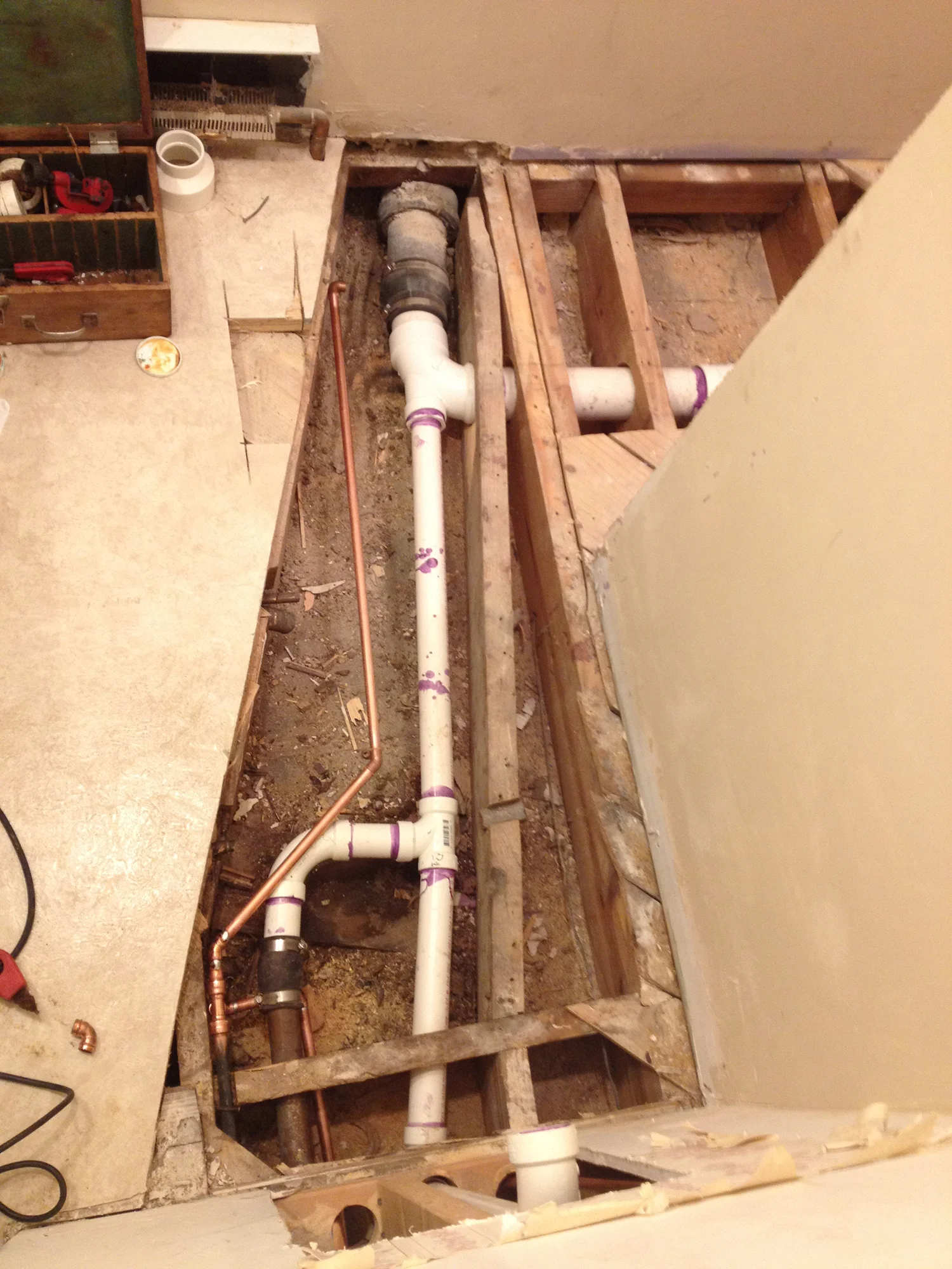 Relocating the plumbing work to the new space.