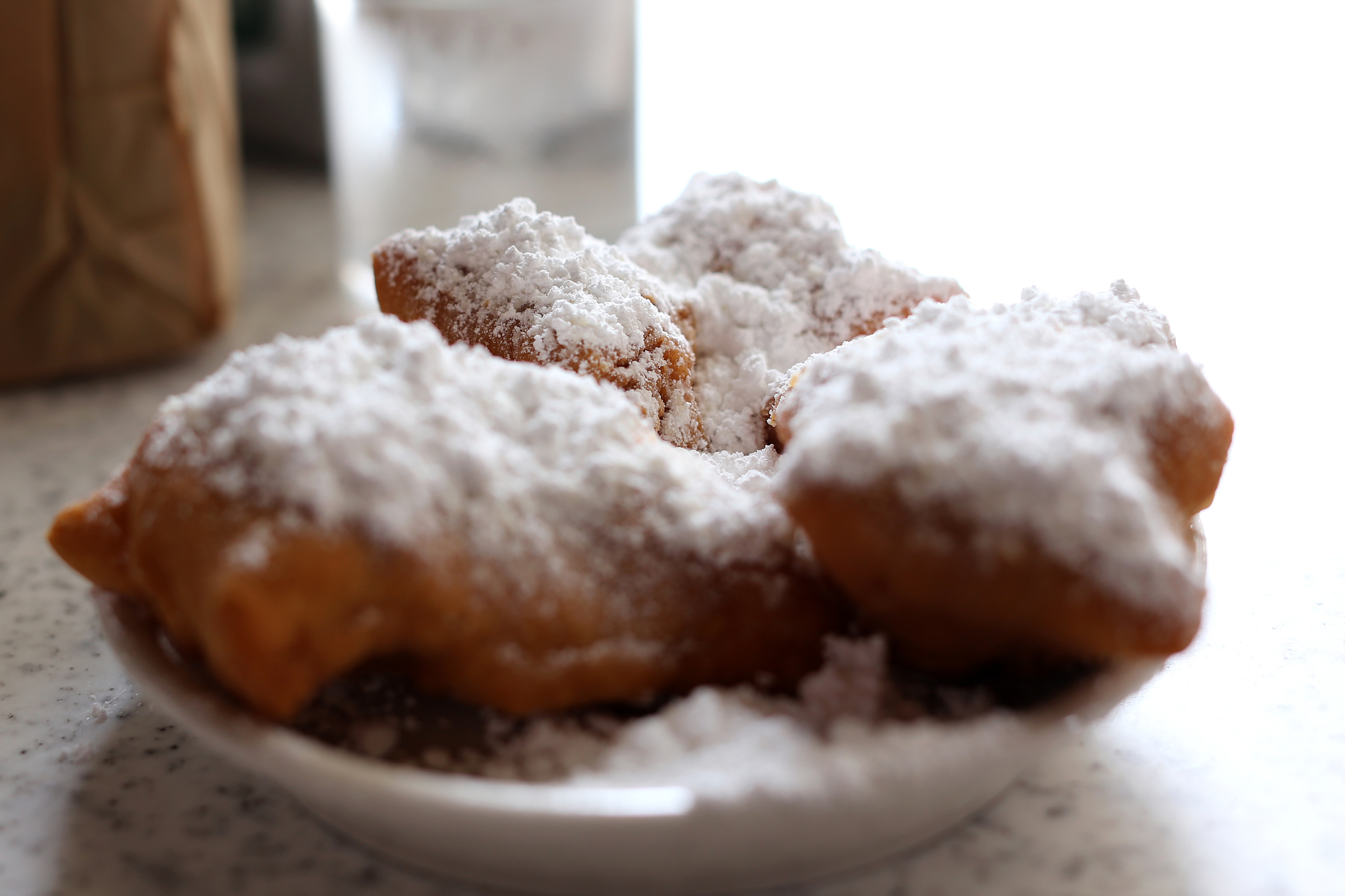 Cafe Du Monde only serves B eignets and coffee and you'll be lucky if you find a seat. 