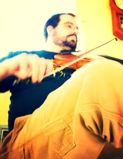 Devon Léger Devon plays fiddle and does "les pieds" (or 'fancy footwork' in English)