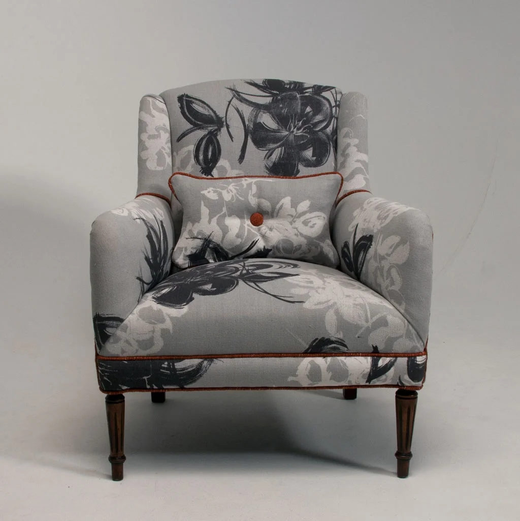 Chair covered in Hellebores ( grey ) fabric