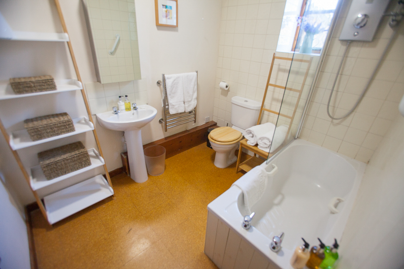  Downstairs bathroom with shower and bath 