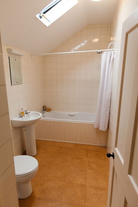  Bathroom with shower and bath and fluffy towels 