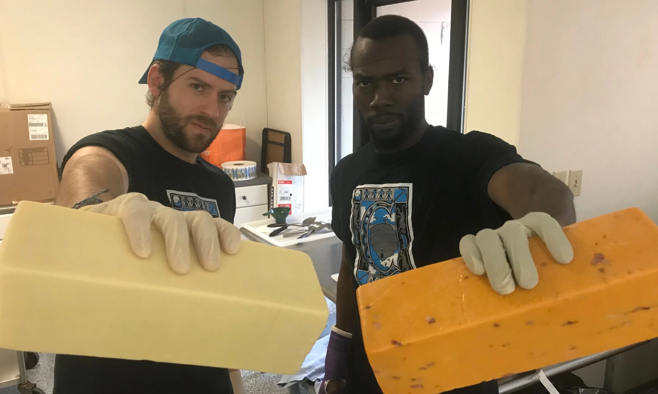 Marcus and I attempting our toughest cheese-snarls.