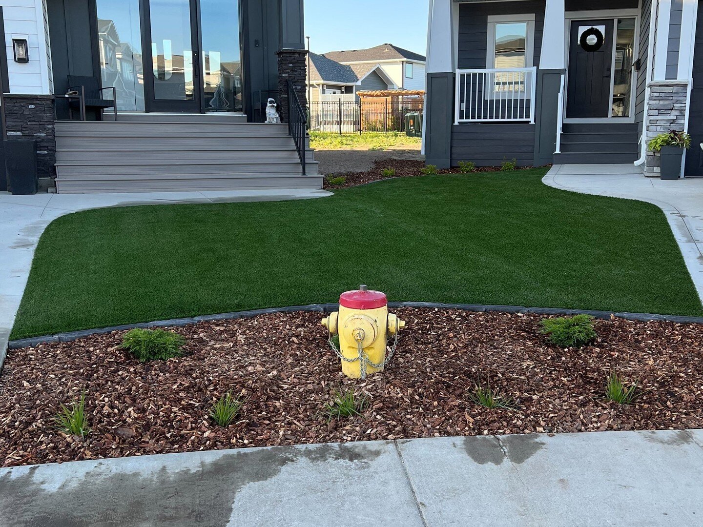 That is quite an upgrade! Artificial turf, mow edge, mulch and plants.
This shared front yard is a great way to keep both your and your neighbour's side looking wonderful!
.
.
.
#KeystoneOutdoorLiving #Saskatoon #LandscapeDesign #SwimmingPools #Patio