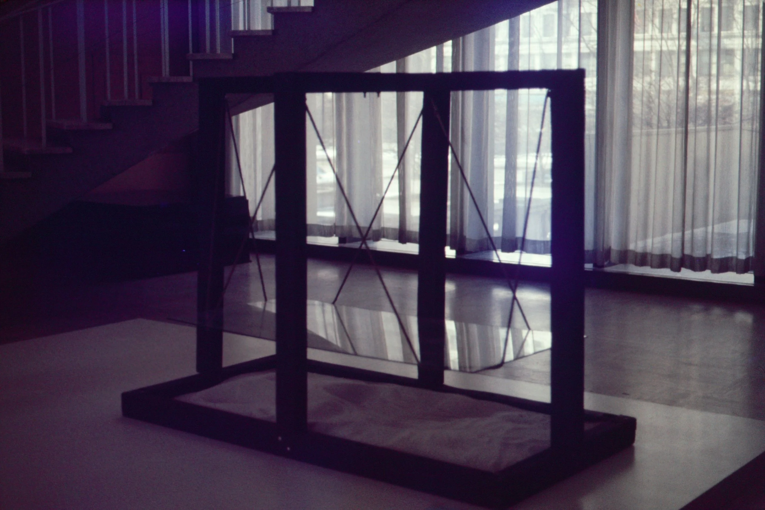 Suspended Glass from Glass Box over White Sand (1975)