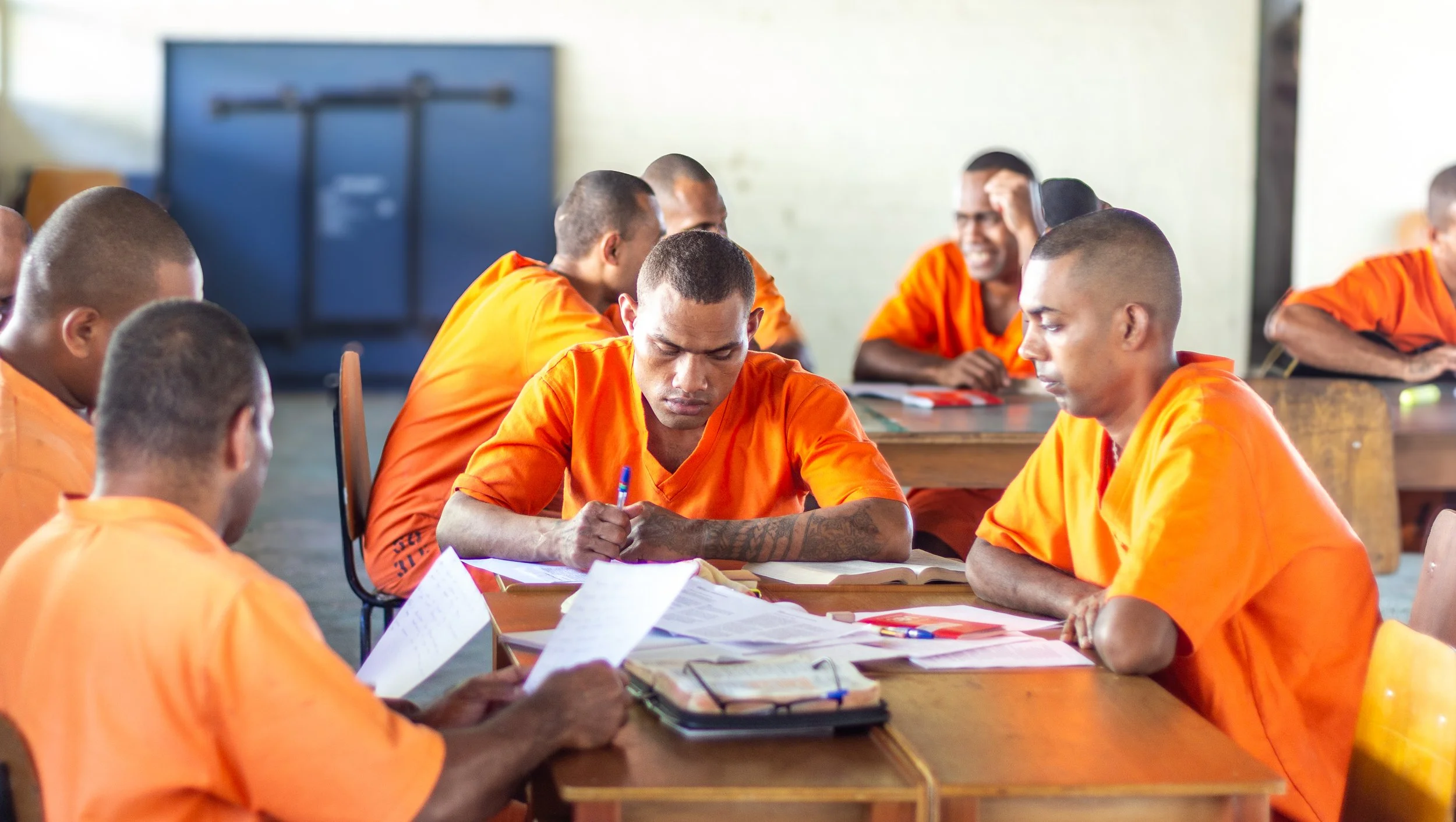 Men working together in one of OF rehabilitation programs