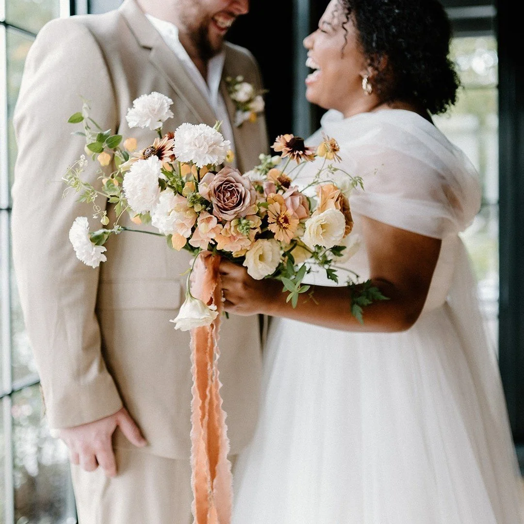 The pure JOY radiating from these two... and a moment for the arrangement. 💐
photo @emily.steward 
florals @anthousai