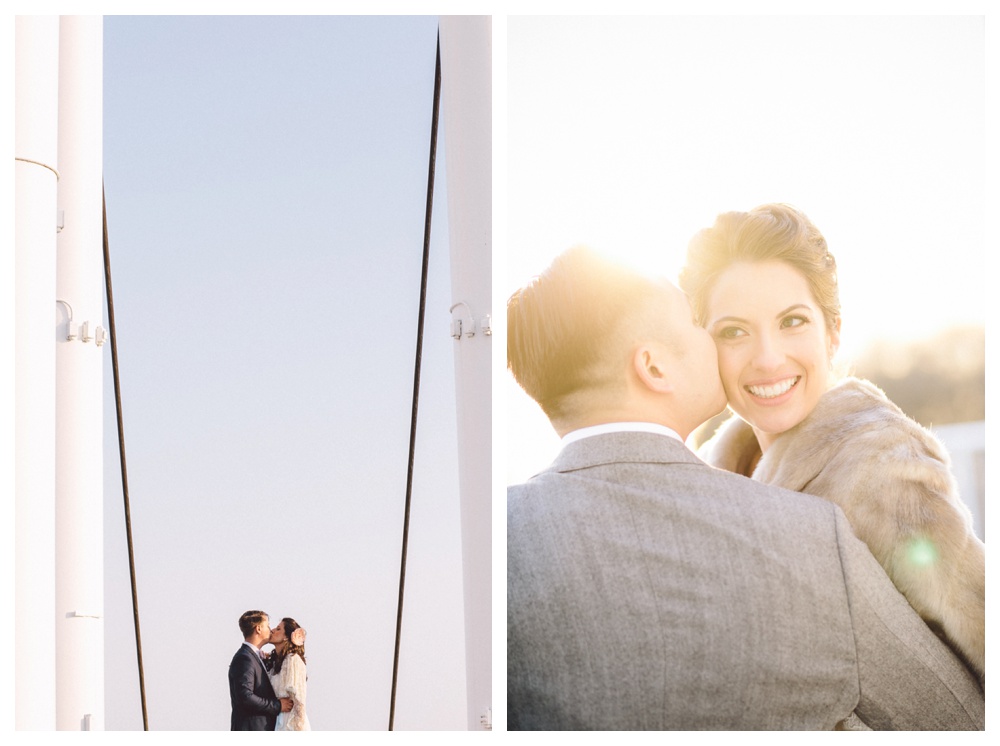 Couple kisses on top of Atlantis Pavillion in Toronto on their wedding day.
