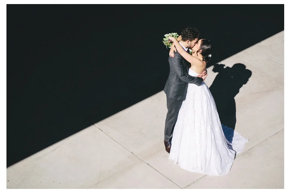 Couple kiss at the Toronto Underpass Park.