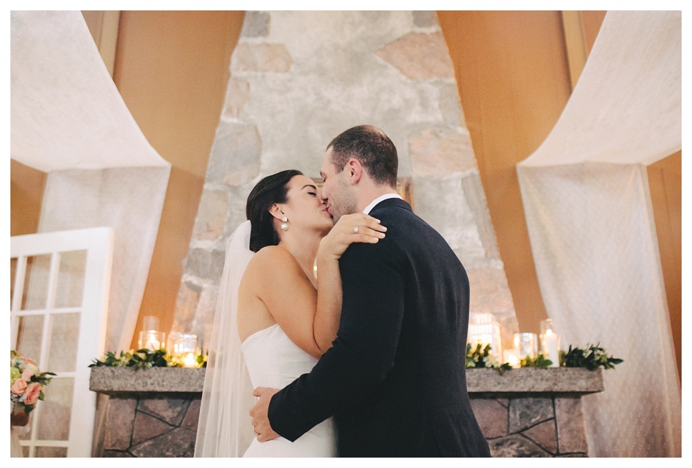 Ceremony kiss at the briars on a rainy wedding.