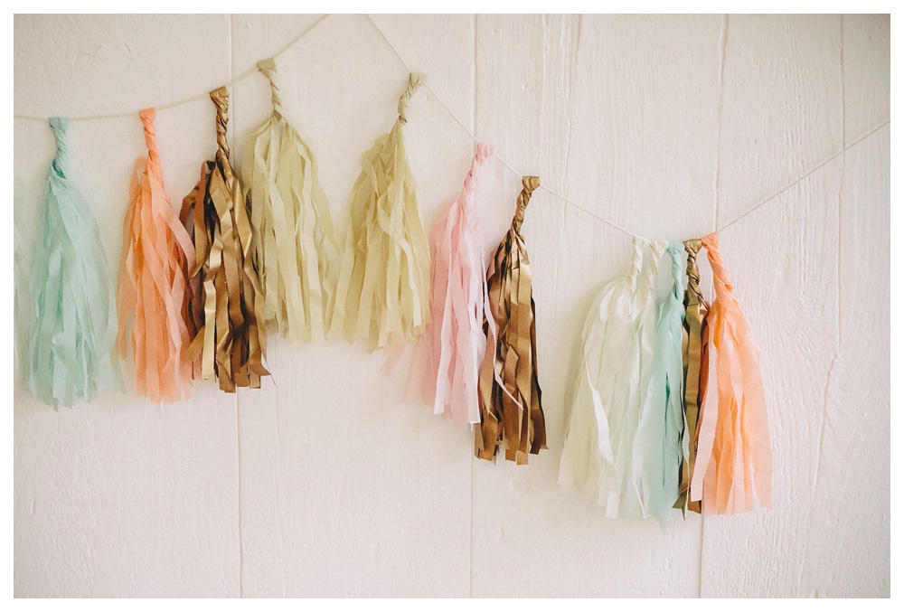 Pastel coloured tassels decorate the briars on a weddig.
