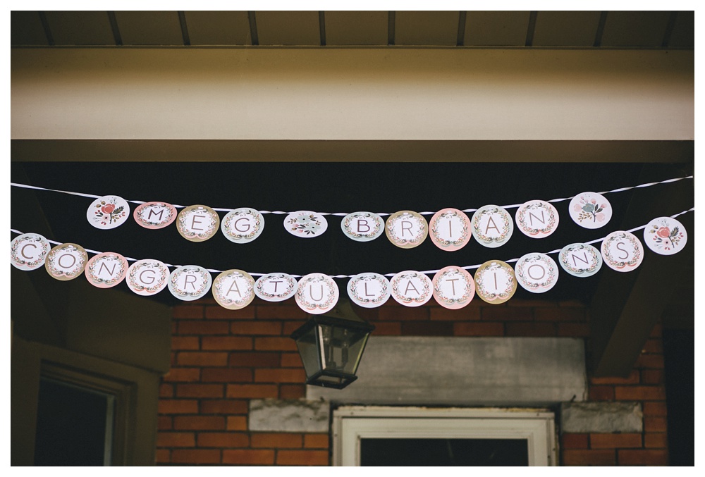 Rifle Co letter banner at an intimate wedding in Toronto.