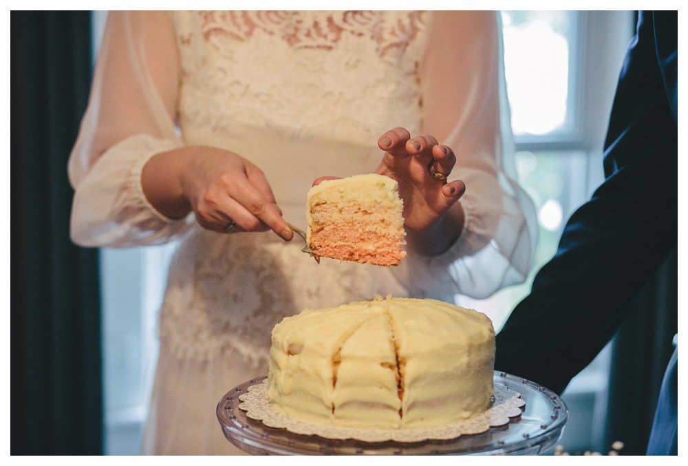 Cutting the cake at an intimate wedding in Toronto.