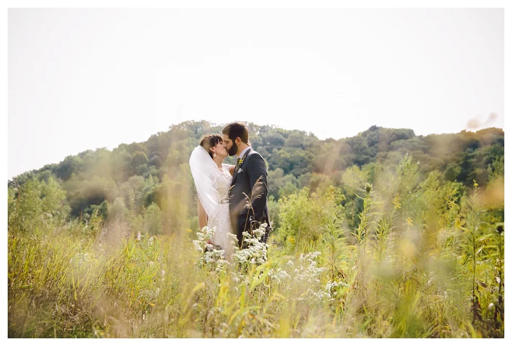 056-unique-wedding-photos-Toronto-Brickworks-kiss-filed.JPG