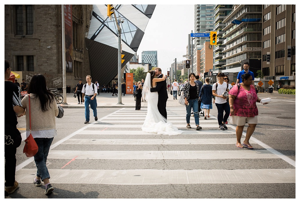 White Toronto, luxe, wedding, wedding dress, Gardiner Museum, 99 Sudbury, Ashley Lindzon, The ROM, Toronto, street, kiss, love, couple, bride and groom, Royal Ontario Musuem, crosswalk, Inbal Dror