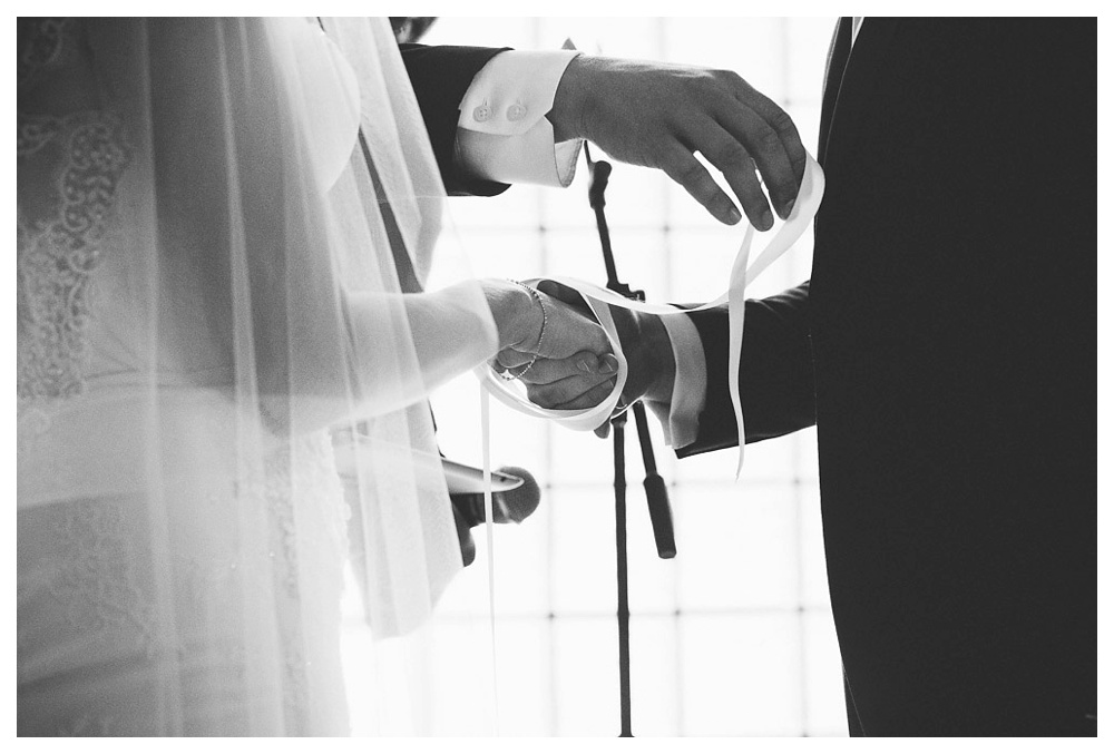 White Toronto, luxe, wedding, wedding dress, Gardiner Museum, 99 Sudbury, Ashley Lindzon, ceremony, vows, hand tying, black and white, wedding ceremony, love, wedding day