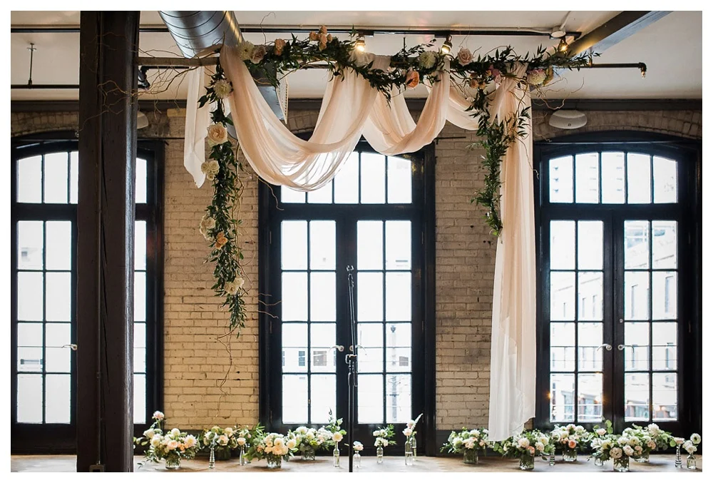 92-DanijelaWeddings-wedding-Toronto-BlueJays-StorysBuilding-BlushandBloom-ceremonybackdrop-flowers.JPG
