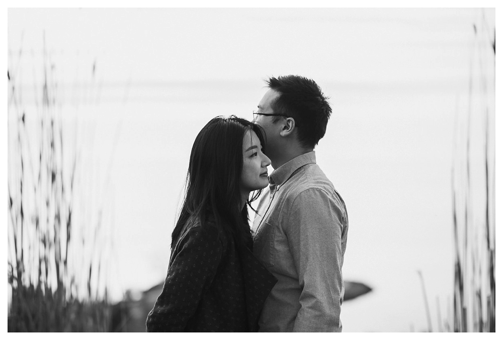 Loving embrace by the bride and groom to be overlooking the Scarborough Bluffs