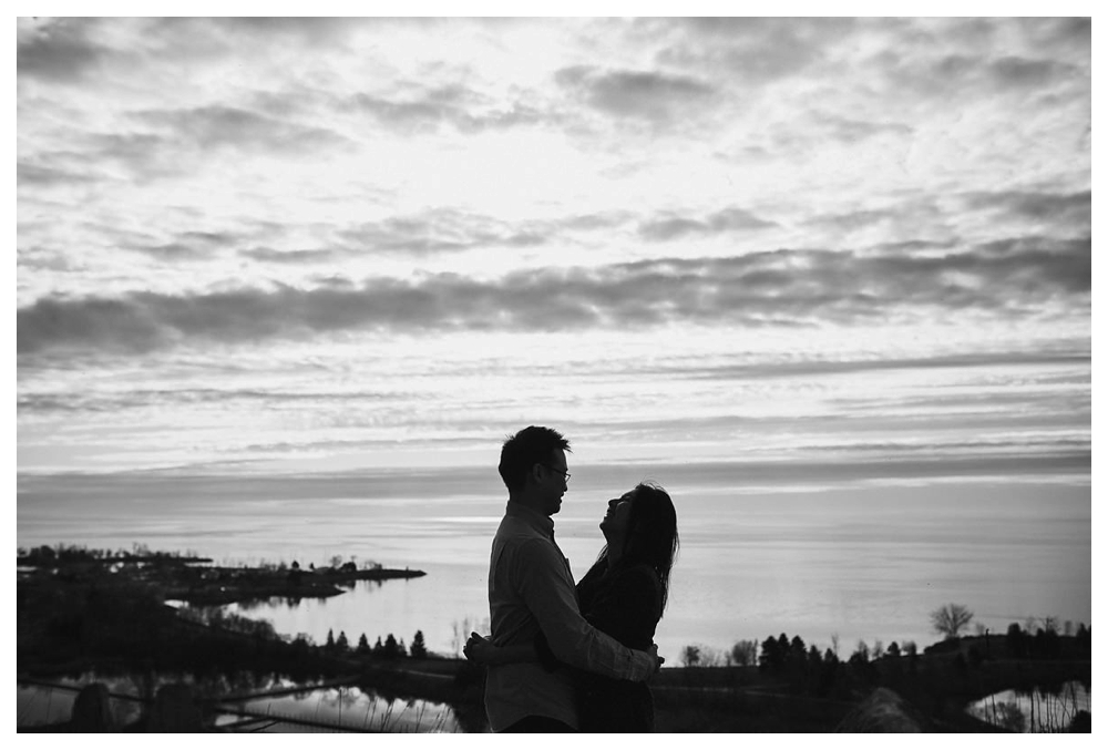 With the view of lake Ontario from the perfect spot in Scarborough Bluffs, laughter and joy comes to life in engagement photos. 