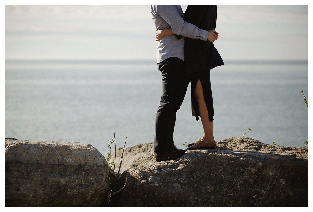 With the lake Ontario in the background, the hugs captured through photography speak volumes of love of this bride and groom. 